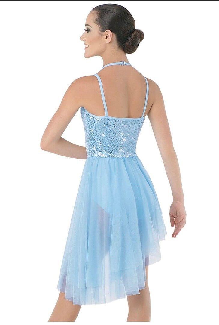 Back view of pale blue Weismann skating dress with open back and layered mesh skirt