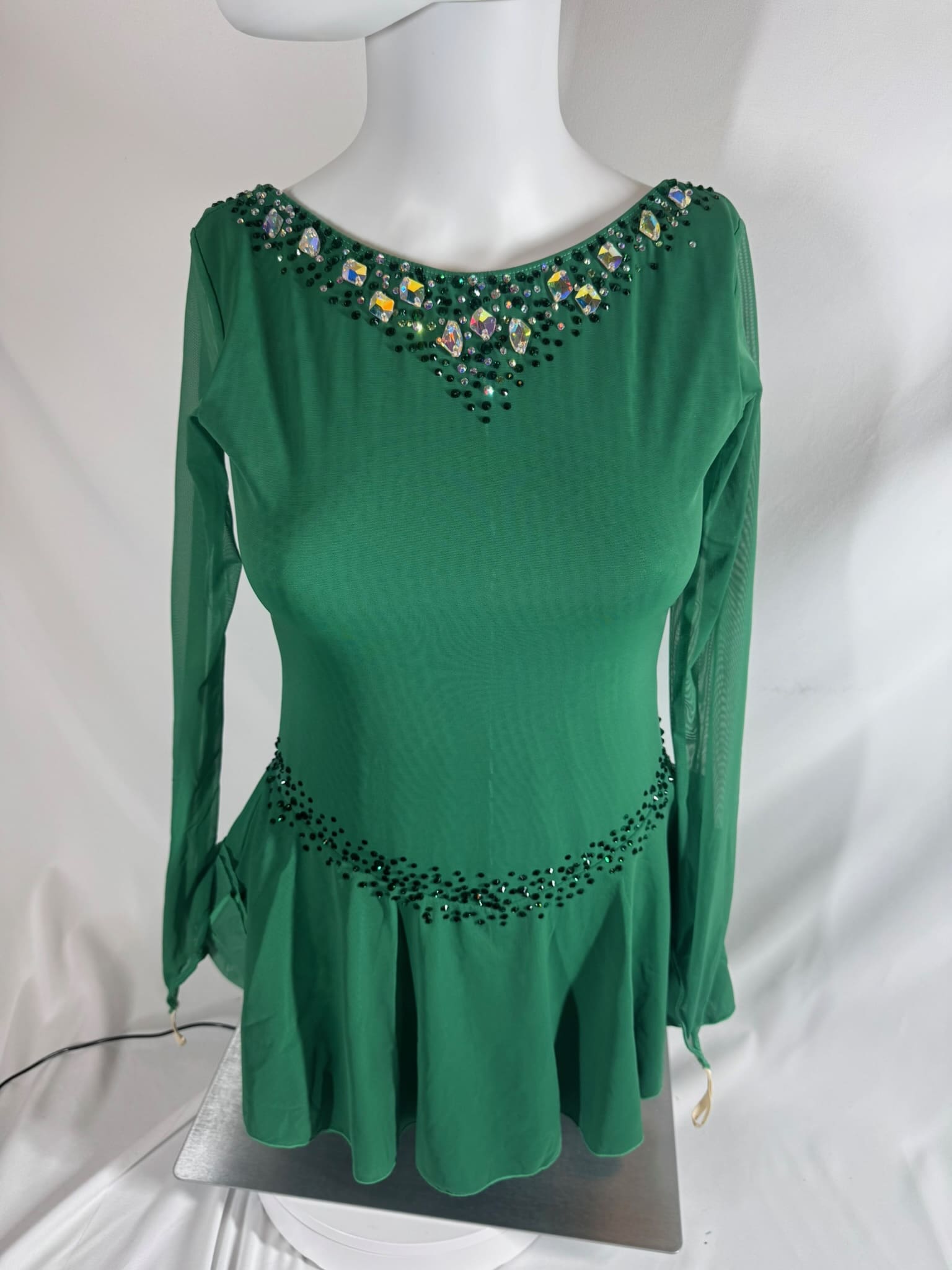 front view of Green Fireflies Rhinestone Cross Back Figure Skating Dress