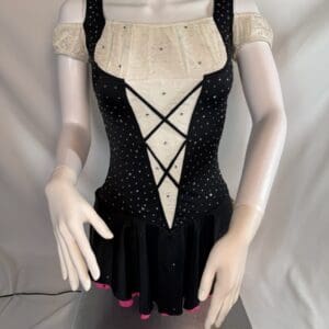 front view of Black and Ivory Lace Up Rhinestone Figure Skating Dress