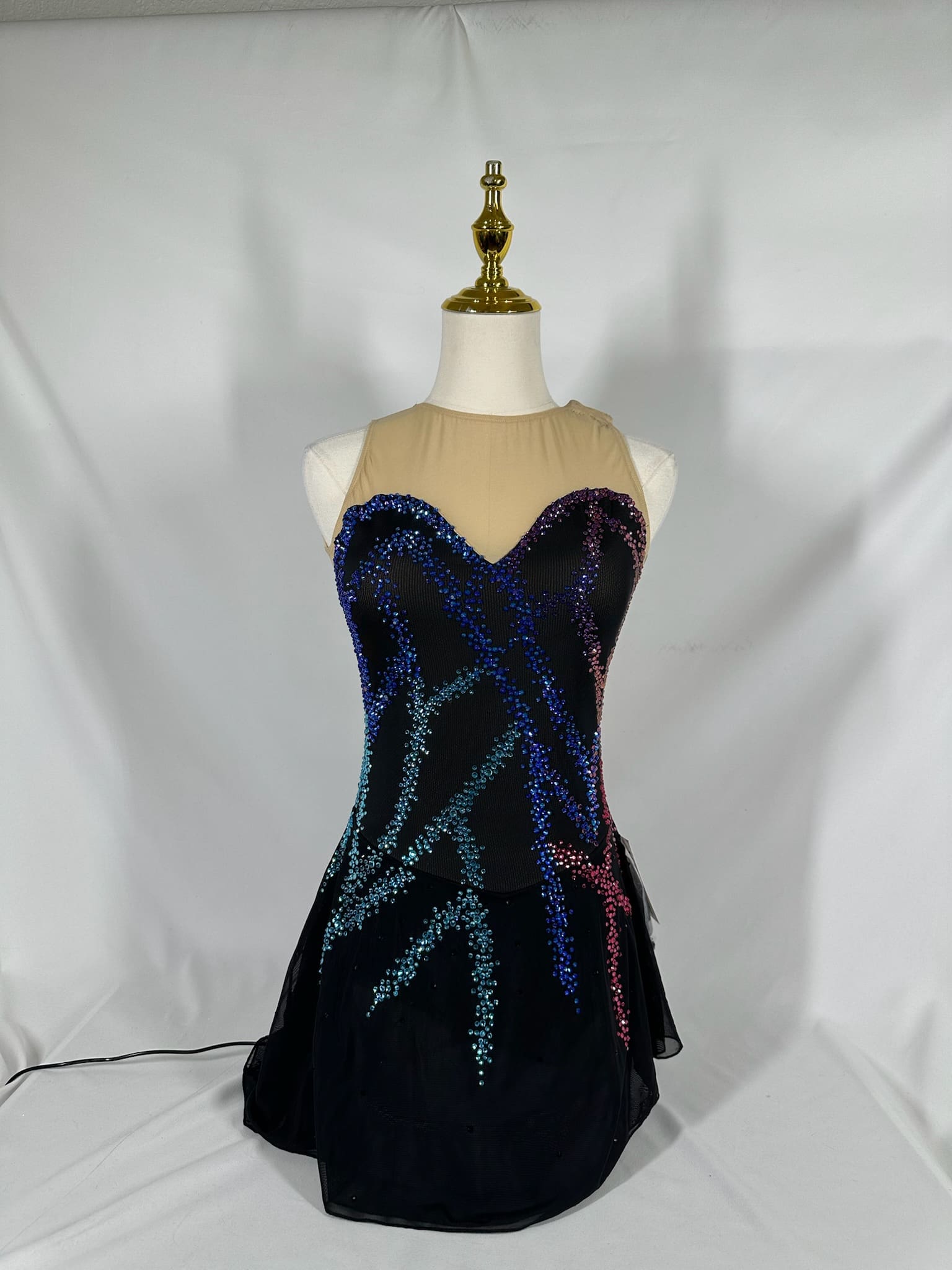 front view of Black And Nude Rhinestone Sleeveless Skating Dress