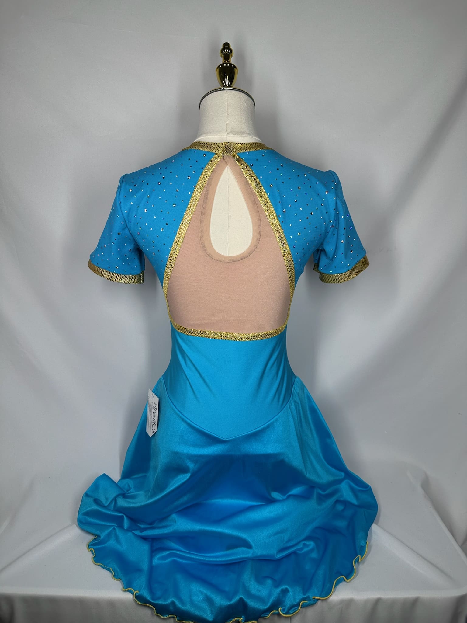 additional view of Turquoise Gold Princess-Inspired Figure Skating Dress