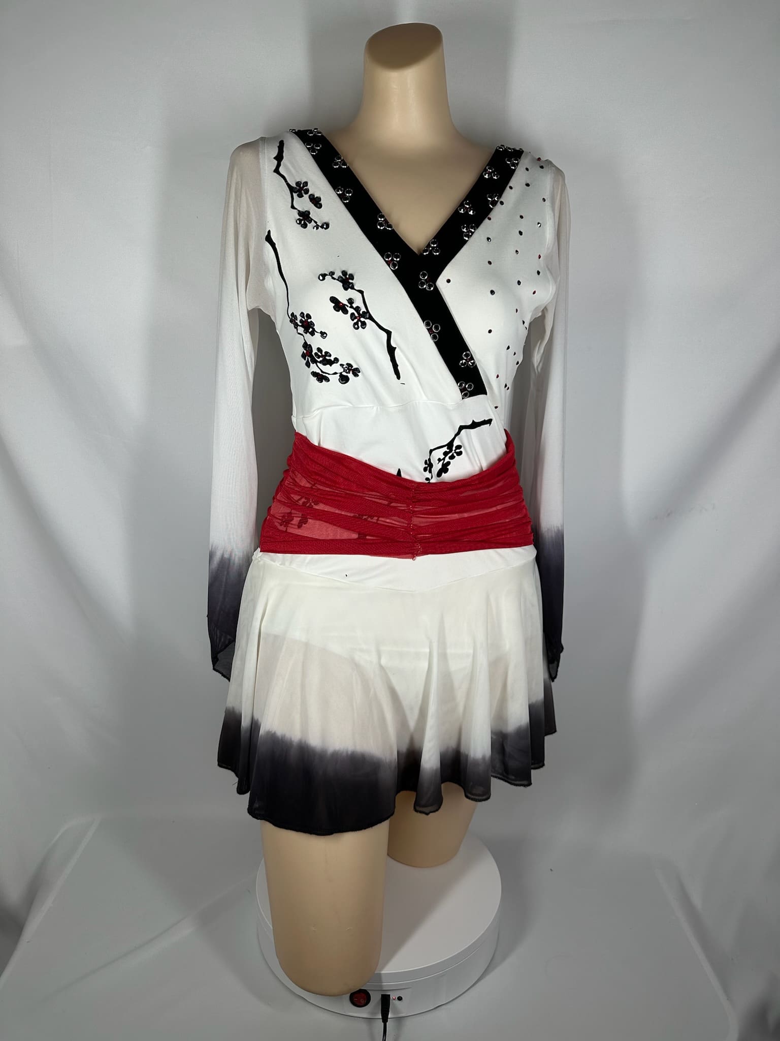 front view of White Black Red Floral Sash Asian-Inspired Skating Dress