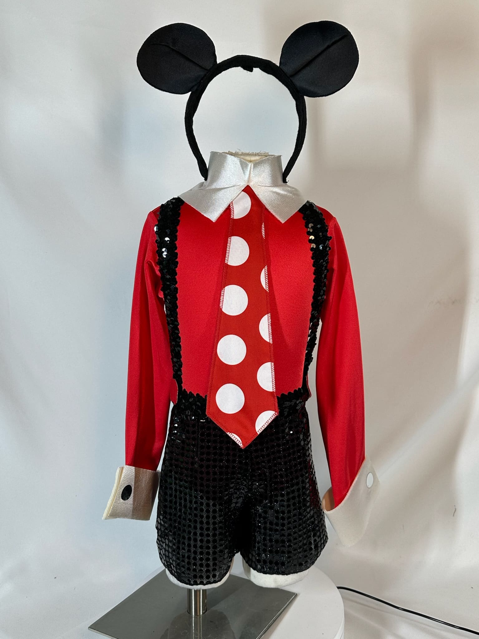 front view of Mickey-Inspired Red Black Sequined Skating Outfit