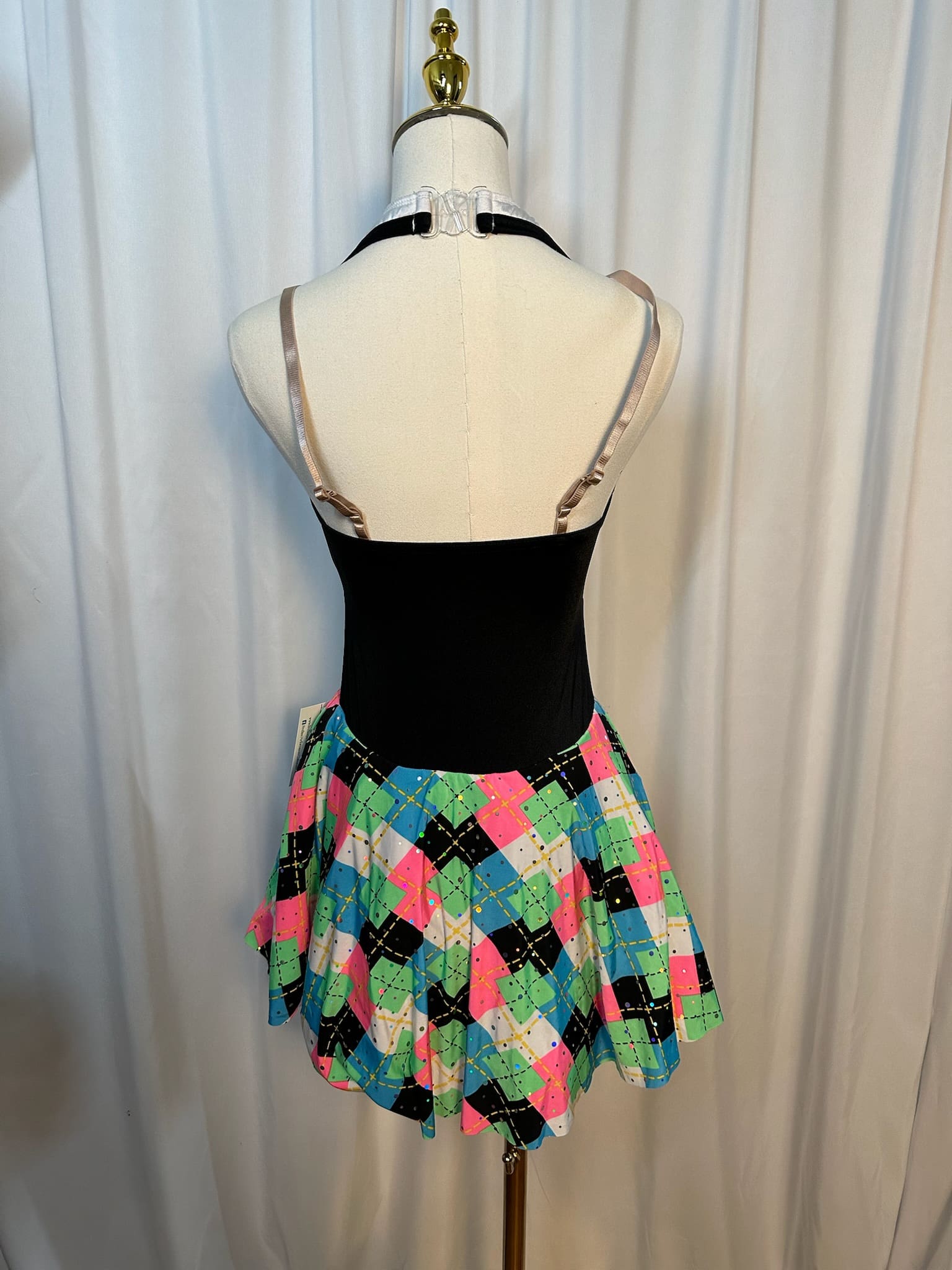 front view of Colorful Plaid Tuxedo Style Figure Skating Dress
