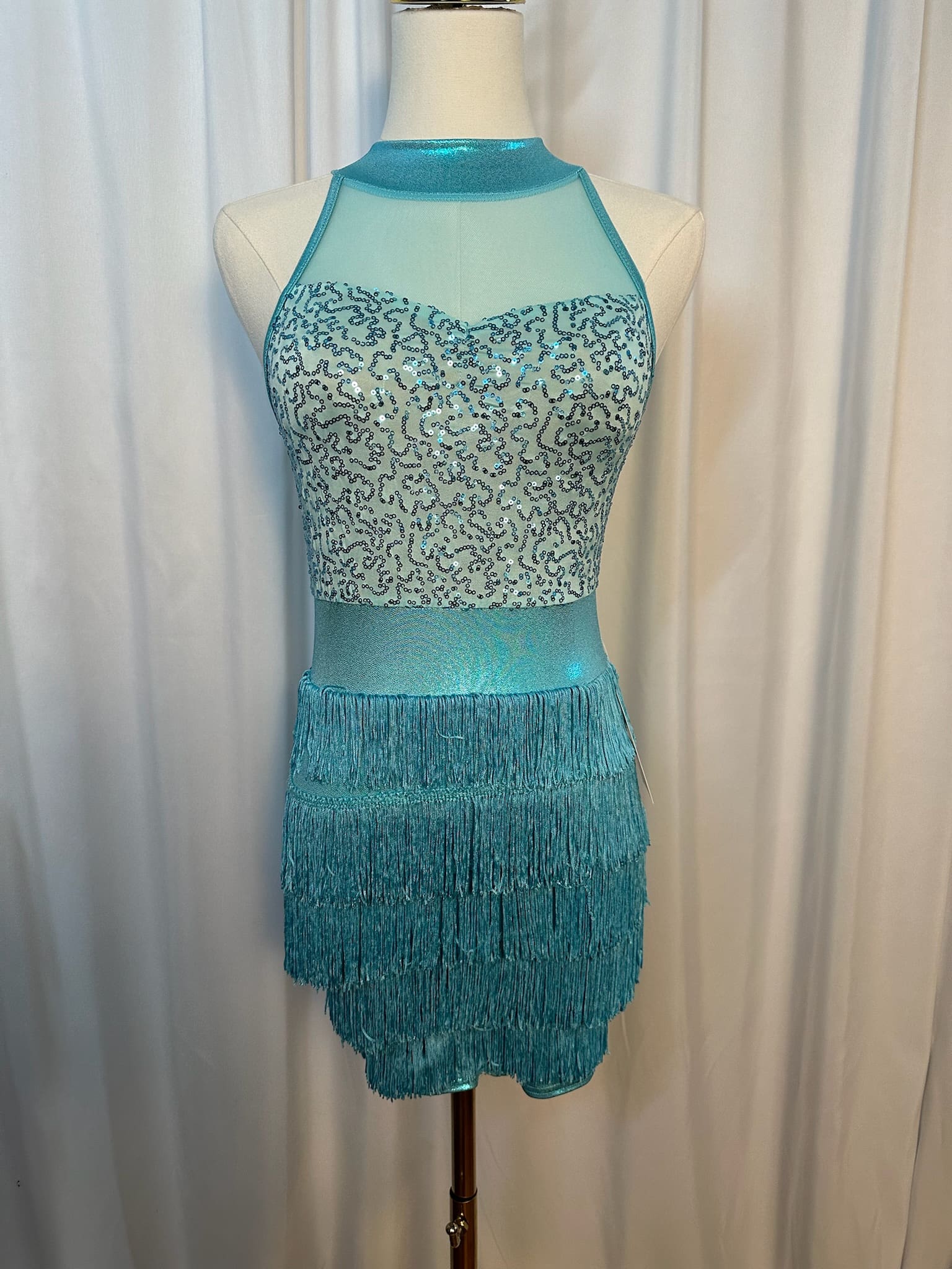 front view of Turquoise Sequin Fringe Halter Figure Skating Dress
