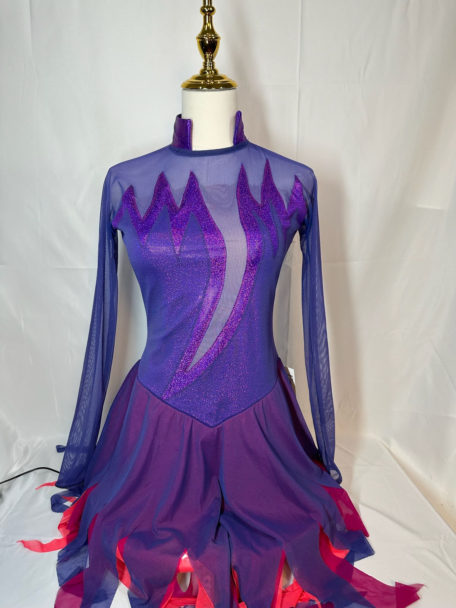 front view of Purple and Magenta Flame Del Arbour Figure Skating Dress