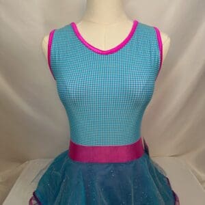 front view of Turquoise Gingham Pink Trim Glitter Tulle Skating Dress