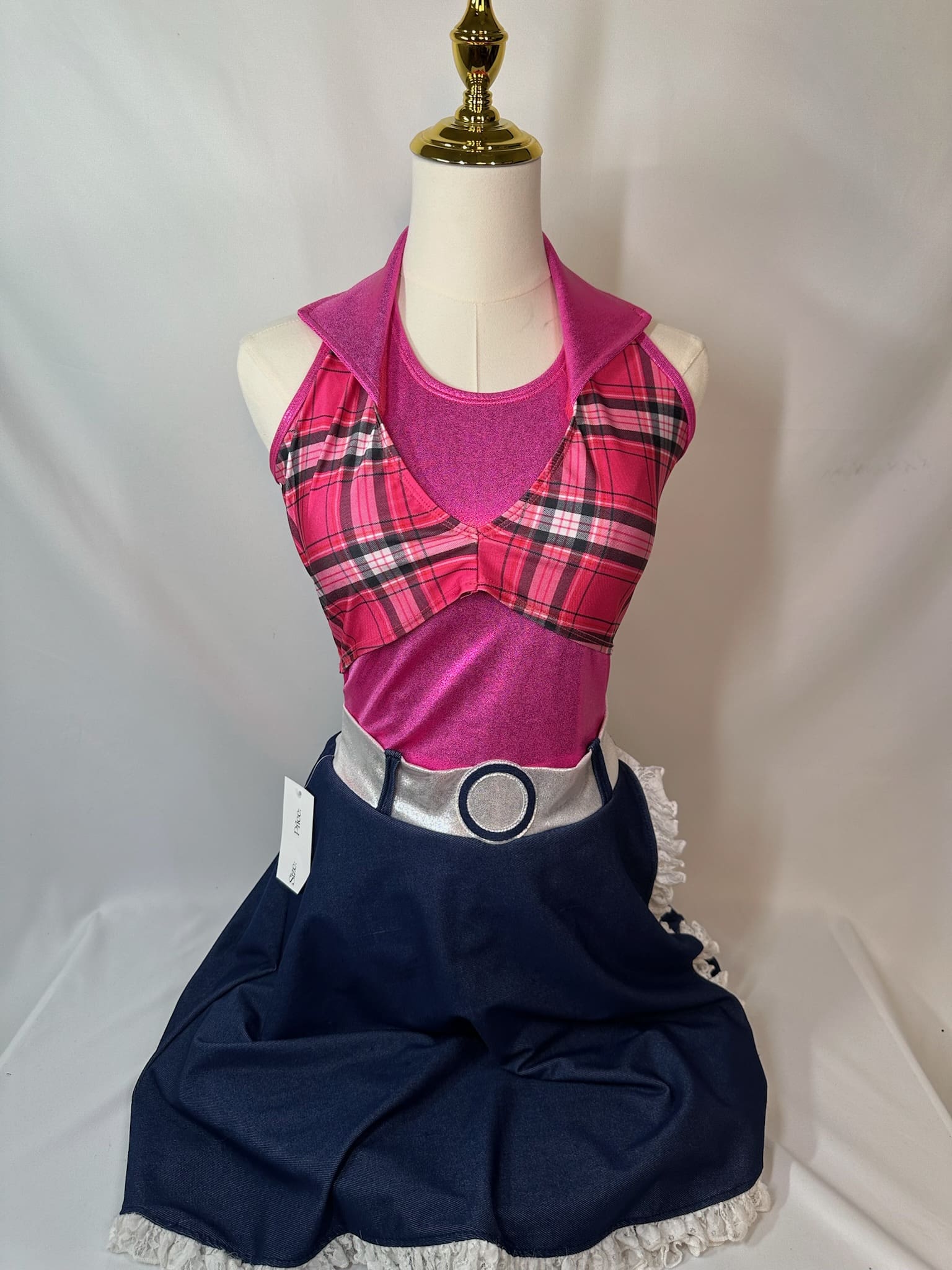 front view of Pink Plaid Western Halter Skating Dress