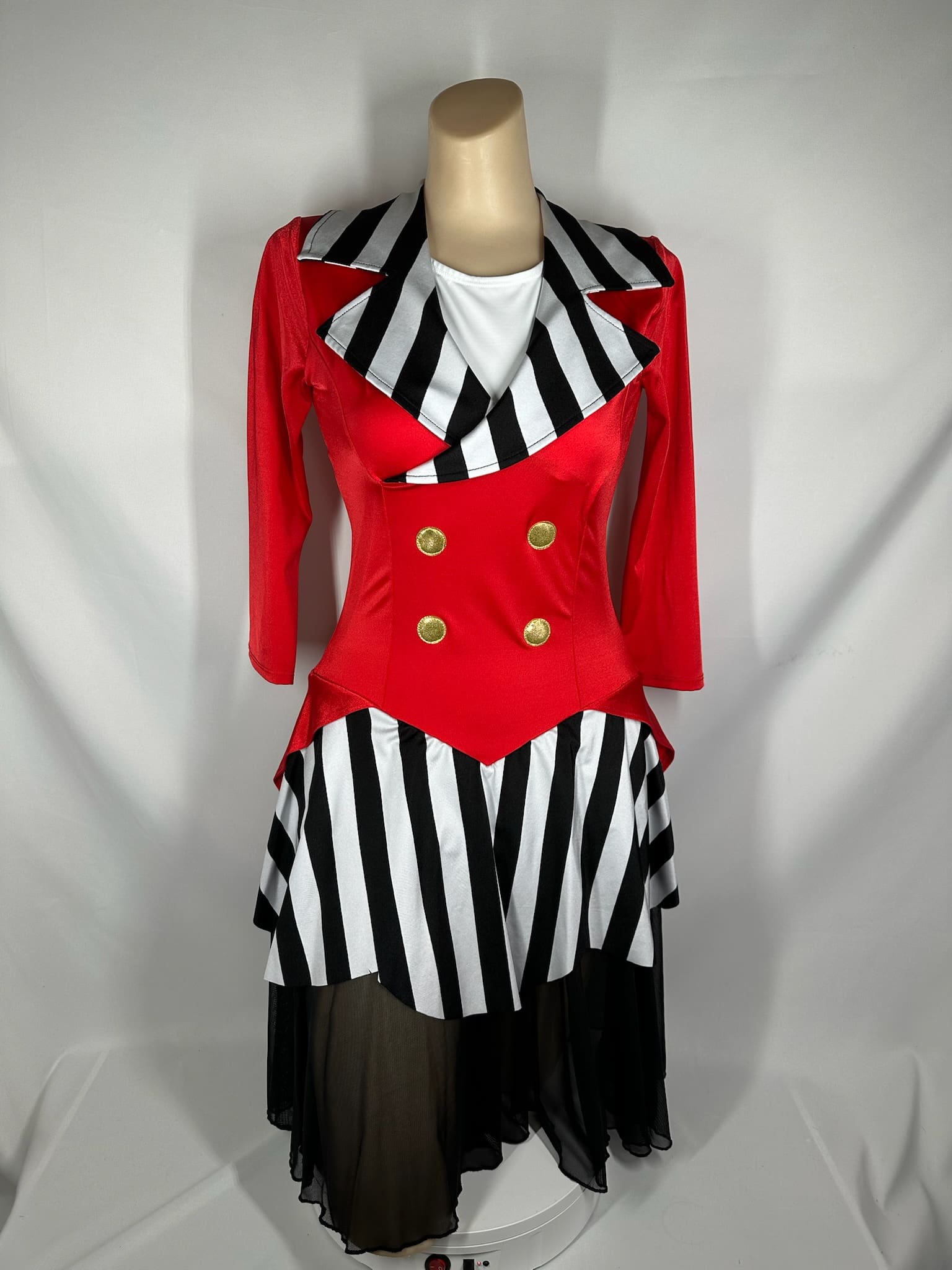 front view of Red Ringmaster Black White Striped Skating Dress