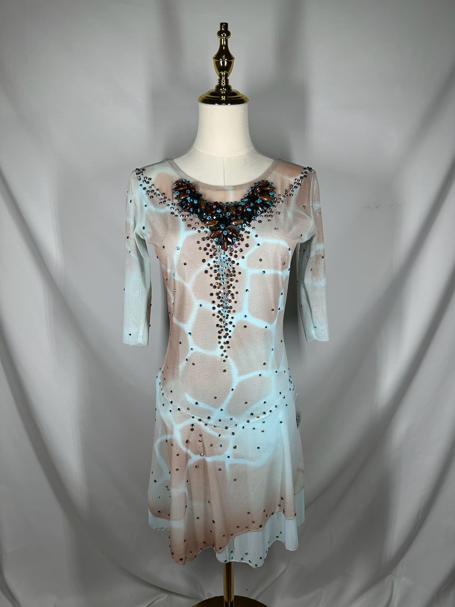 front view of Pale Blue Nude Rhinestone Lyrical Figure Skating Dress