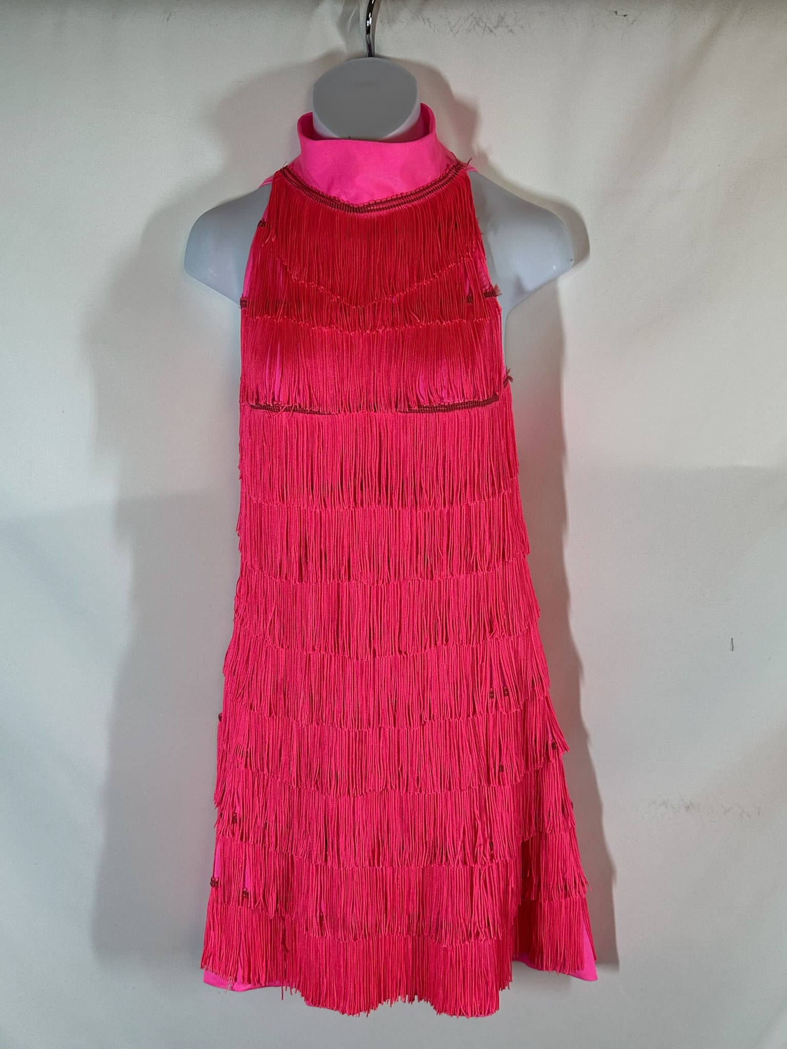 front view of Hot Pink Layered Fringe Figure Skating Dress