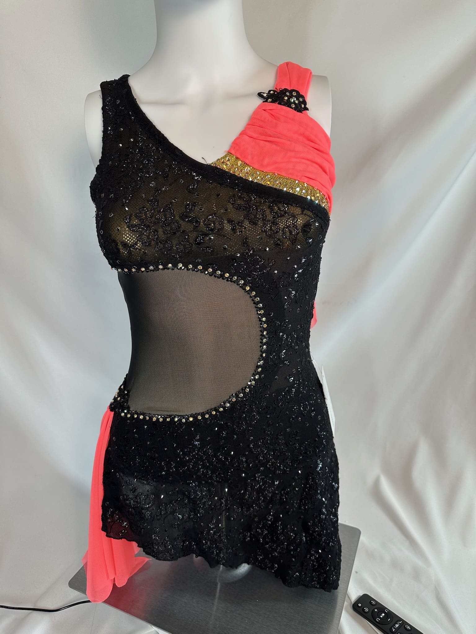 front view of Black Lace And Coral One Shoulder Skating Dress